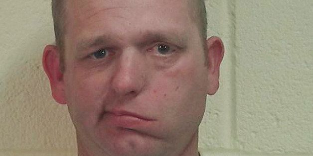 This undated photo released by the Iron County Sheriff's office, shows Ryan Bundy. The son of southern Nevada rancher and states' rights advocate Cliven Bundy said Wednesday, Jan. 28, 2015, he spent a night in a southern Utah county jail after sheriff's deputies accused him of resisting arrest when he appeared in a justice court for an unrelated code violation summons. (AP Photo/Iron County Sheriffs Office)