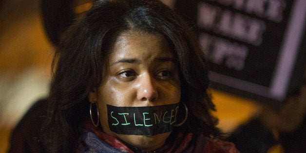 ST. LOUIS, MO - MARCH 14: Ferguson activists march through downtown during a protest on March 14, 2015 in St. Louis, Missouri. St. Louis and the nearby town of Ferguson have experienced many protests, which have often been violent, since the death of Michael Brown who was shot and killed by a Ferguson police officer in August. On Wednesday evening two police officers were shot while they were securing the Ferguson police station during a protest. (Photo by Scott Olson/Getty Images)