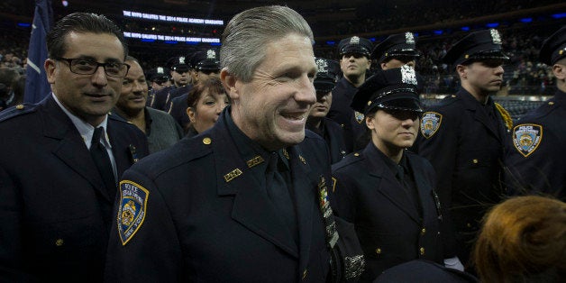 Patrick Lynch, president of the Patrolmen's Benevolent Assoication, attends a New York Police Academy graduation ceremony, Monday Dec. 29, 2014, at Madison Square Garden in New York. Nearly 1000 officers were sworn in as tensions between city hall and the NYPD continued following the Dec. 20 shooting deaths of officers Rafael Ramos and Wenjian Liu. (AP Photo/John Minchillo)