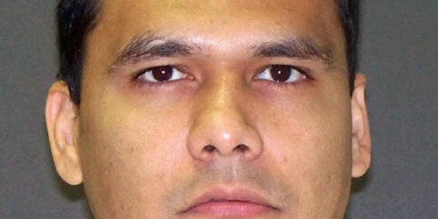 This undated handout photo provided by the Texas Department of Criminal Justice shows Manuel Garza Jr. Garza is scheduled to be executed for the 2001 shooting death of San Antonio, Texas, SWAT officer John ￃﾢￂﾀￂﾜRockyￃﾢￂﾀￂﾝ Riojas. (Texas Department of Criminal Justice via AP)