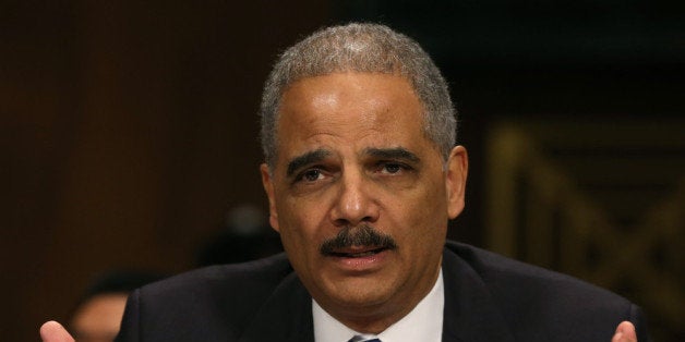 WASHINGTON, DC - JANUARY 29: Attorney General Eric Holder testifies during a Senate Judiciary Committee hearing on Capotil Hill, on January 29, 2014 in Washington, DC. The committee is hearing testimony on oversight of the Justice Department and reform of government surveillance programs. (Photo by Mark Wilson/Getty Images)