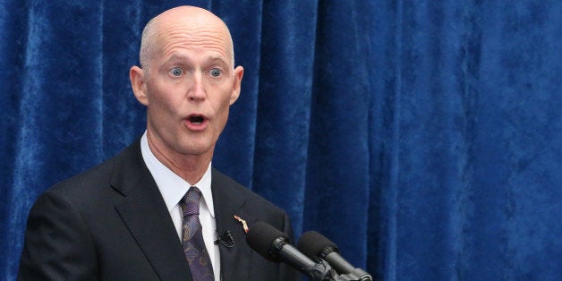 Florida Gov. Rick Scott speaks to the media during a pre-legislative news conference, Wednesday, Jan. 28, 2015, in Tallahassee, Fla. (AP Photo/Steve Cannon)