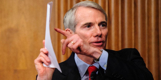 Senator Rob Portman, a Republican from Ohio, questions witnesses during a Senate Finance Committee hearing...