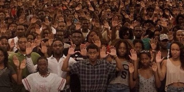 Howard University. Solidarity with Mike Brown. Hand's up don't shoot. Protest against police brutality. August, 2014.