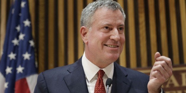 New York City Mayor Bill de Blasio speaks during a news conference at police headquarters in New York, Monday, Dec. 22, 2014. De Blasio called Monday for a pause in protests over police conduct as he faced a widening rift with those in a grieving force who accuse him of creating a climate of mistrust that contributed to the execution of two officers. (AP Photo/Seth Wenig)