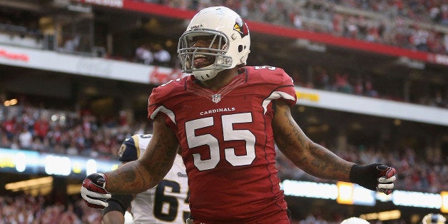 GLENDALE, AZ - DECEMBER 08: Outside linebacker John Abraham #55 of the Arizona Cardinals reacts after a sacking quarterback Kellen Clemens (not picutred) of the St. Louis Rams in the endzone for a safety during the third quarter of the NFL game at the University of Phoenix Stadium on December 8, 2013 in Glendale, Arizona. The Cardinals defeated the Rams 30-10. (Photo by Christian Petersen/Getty Images) 