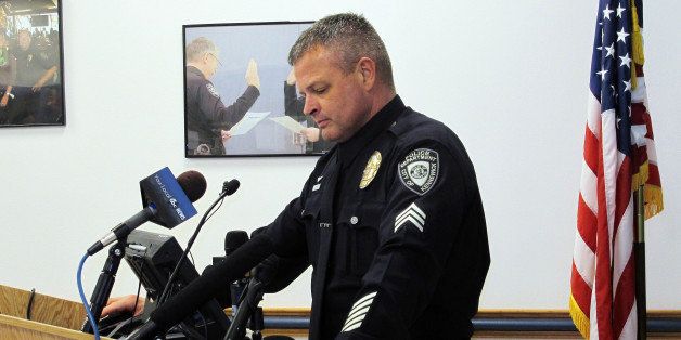 Kennewick Police Sgt. Ken Lattin talks to reporters, Wednesday, Feb. 25, 2015 about the investigation of the fatal police shooting of Antonio Zambrano-Montes, who was unarmed, in nearby Pasco, Wash., on Feb. 10, 2015. Lattin said the three officers involved in the death fired 17 shots, including several that struck Zambrano-Montes, but no shots hit him in the back. (AP Photo/Nicholas K. Geranios)