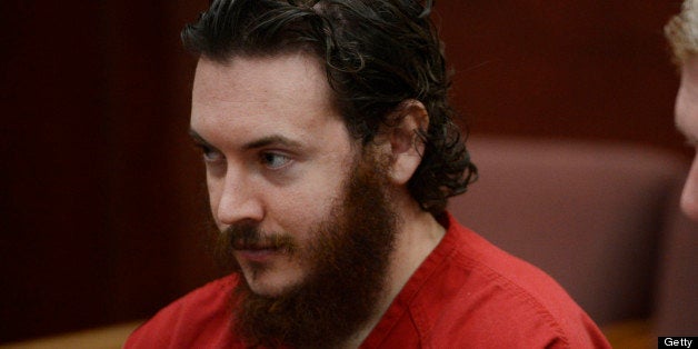 CENTENNIAL, CO - JUNE 04: James Holmes, left, and his defense attorney, Daniel King, in court Tuesday morning June 04, 2013 for an advisement hearing at the Arapahoe County Justice Center. Holmes is accused of killing 12 people and injuring 70 others in a shooting rampage at an Aurora theater, July 20th, 2012. The court accepted James Holmes plea of not guilty by reason of insanity and has ordered a sanity evaluation at the Colorado Mental Health Institute of Pueblo. (Photo By Andy Cross/The Denver Post via Getty Images)