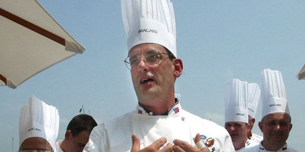**FILE** Chef to president George W. Bush , Walter Scheib, greets chefs from around the world at the Chesapeake Bay Maritime Museum in St. Michaels, Md. in this July 27, 2004 file photo. Scheib, was brought to the White House by Hillary Rodham Clinton. Under President Bush, he continues to cook everything from family meals to official state dinners. (AP Photo/ Matt Houston)
