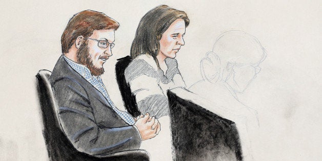 In this courtroom sketch, James Holmes, left, and defense attorney Tamara Brady are depicted, as they sit in court on the first day of jury selection in Holmes' trial, at the Arapahoe County Justice Center, Tuesday, Jan. 20, 2015, in Centennial, Colo. Holmes, whose attorneys acknowledge opened fire at a midnight "Batman" movie back in 2012, is accused of killing 12 people and wounding 70 others. (AP Photo/Jeff Kandyba)