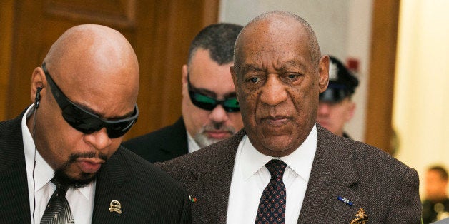 Actor and comedian Bill Cosby arrives for a court appearance Wednesday, Feb. 3, 2016, in Norristown, Pa. Cosby was arrested and charged with drugging and sexually assaulting a woman at his home in January 2004. A judge will decide whether to dismiss a sexual assault case against the comedian over an unwritten promise of immunity that a former prosecutor says he gave Cosby's now-deceased lawyer. (Ed Hille/The Philadelphia Inquirer via AP, Pool)