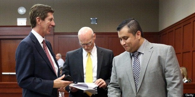 SANFORD, FL - JULY 02: George Zimmerman, with his attorneys, Mark O'Mara (left), and Don West during a recess on the 17th day of Zimmerman's trial in Seminole circuit court, July 2, 2013 in Sanford, Florida. Zimmerman is charged with second-degree murder for the February 2012 shooting death of 17-year-old Trayvon Martin. (Photo by Joe Burbank-Pool/Getty Images)