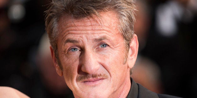 Sean Penn arrives on the red carpet at the screening of the film Mad Max: Fury Road at the 68th international film festival,