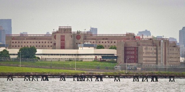 FILE- In this June 11, 2014 file photo, the eastern section of Rikers Island jail complex in the Queens borough of New York is shown. A series of reports on Rikers Island jail inmate deaths by Associated Press reporter Jake Pearson, that exposed brutality, neglect and mismanagement in the cityￃﾢￂﾀￂﾙs biggest lockup has won the top prize in the New York Press Club Awards. (AP Photo/Bebeto Matthews, File)