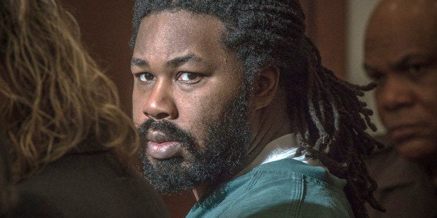 FILE - In this Nov. 14, 2014 file-pool photo, Jesse Matthew, right, looks toward the gallery while appearing in court in Fair