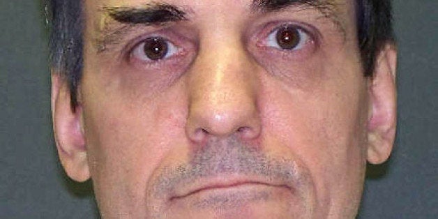 FILE - This file handout photo provided by the Texas Department of Criminal Justice shows Scott Panetti. Panetti's execution is set for Dec. 3, 2014 but Panettiￃﾢￂﾀￂﾙs attorneys want the death date withdrawn or at least delayed to allow for a new round of psychological testing to determine if heￃﾢￂﾀￂﾙs competent to be executed. They believe his case should again raise questions over the legality of executing the mentally ill: an issue the U.S. Supreme Court has previously considered. (AP Photo/Texas Department of Criminal Justice)