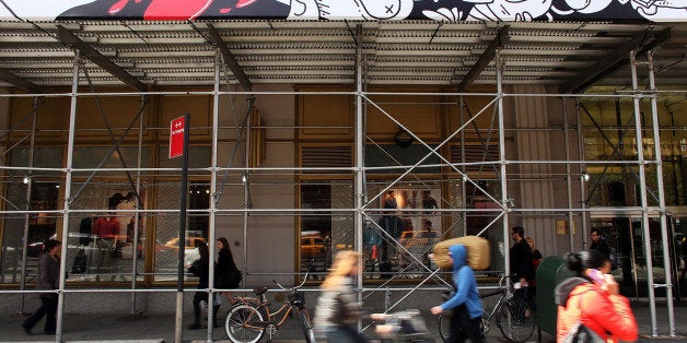 NEW YORK, NY - APRIL 10: A vinyl mural attached to the scaffolding wrapping around Google's New York headquarters along Eighth Avenue is viewed on April 10, 2012 in New York City. The cartoons on the 450-foot-long, 4-foot-tall mural were drawn by Mark Miller and Dave Franzese, of the Williamsburg, Brooklyn design studio Dark Igloo and refer to famous landmarks and key figures in Chelsea's past. Jack Kerouac, who wrote On the Road at the Chelsea Hotel in the 1950s is included in the mural as is Major Thomas Clark, who named the neighborhood in the 1700s. The scaffolding and mural will be up through the end of May. (Photo by Spencer Platt/Getty Images)