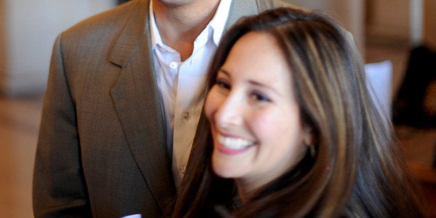 Suspended San Francisco Sheriff Ross Mirkarimi and his wife Eliana Lopez arrive at a Board of Supervisors meeting on Tuesday, Oct. 9, 2012, in San Francisco. The Board planned to vote on removing Mirkarimi, who pled guilty to a misdemeanor charge in a domestic violence case, from office. (AP Photo/Noah Berger)