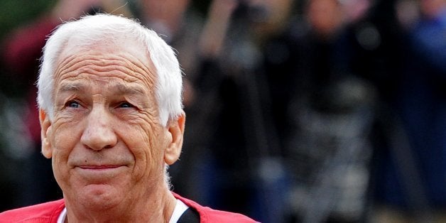 BELLEFONTE, PA - OCTOBER 09: Former Penn State assistant football coach Jerry Sandusky walks into the Centre County Courthouse before being sentenced in his child sex abuse case on October 9, 2012 in Bellefonte, Pennsylvania. Sandusky faces more than 350 years in prison for his conviction in June on 45 counts of child sexual abuse, including while he was the defensive coordinator for the Penn State college football team. (Photo by Patrick Smith/Getty Images)