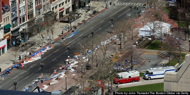 BOSTON - APRIL 16: Boston Marathon Explosion aftermath. Boylston Street is blocked off at Copley Square, where runners got water after crossing the finish line. (Photo by John Tlumacki/The Boston Globe via Getty Images)