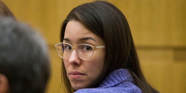 Jodi Arias looks back towards the camera during her sentencing retrial Monday, Nov. 24, 2014, in Maricopa County Superior Co