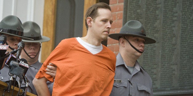 Eric Frein is escorted from his arraignment in the Pike County Courthouse on Friday, Oct. 31, 2014 in Milford, Pa. (Harry Fis