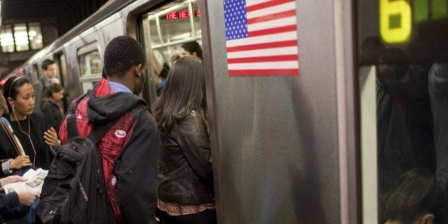 NEW YORK - MARCH 22: Morning commuters crowd into a subway car March 22, 2012 in New York City. In 2010, New York's subway sy