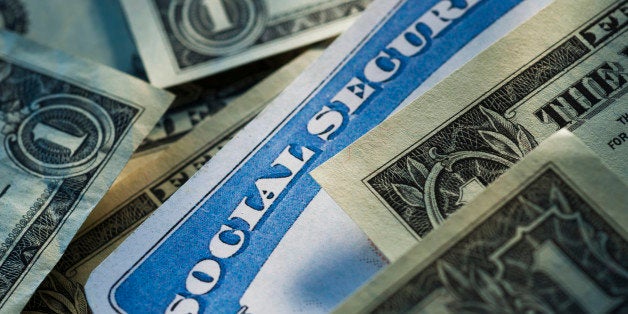 Studio shot of social security card and banknotes