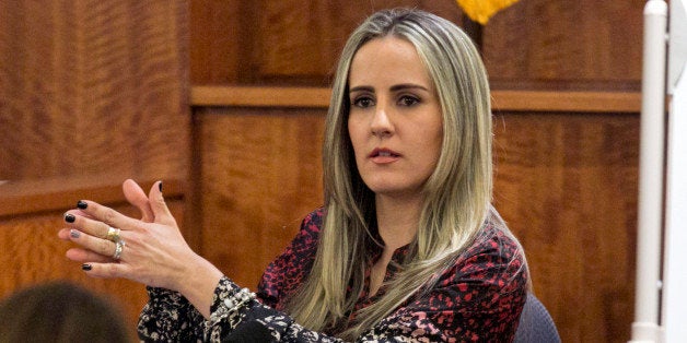 Grazielli Silva testifies during the murder trial for former NFL player Aaron Hernandez at the Bristol County Superior Court in Fall River, Mass., Monday, Feb. 23, 2015. Hernandez is accused of killing Odin Lloyd on the morning of June 17, 2013. (AP Photo/The Boston Globe, Dominick Reuter, Pool)