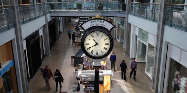 COLUMBIA, MD - JANUARY 27: Mall in Columbia is preparing to reopen two days after three people were shot and killed at the shopping mall January 27, 2014 in Columbia, Maryland. Authorities say Darion Marcus Aguilar, 19, killed two employees at the skateboarding and surfing clothing store Zumiez in the mall before fatally shooting himself. Investigators still have no motive for the shooting. (Photo by Chip Somodevilla/Getty Images)