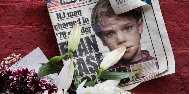 FILE - This May 28, 2012, file photo shows a newspaper with a photograph of Etan Patz that is part of a makeshift memorial in