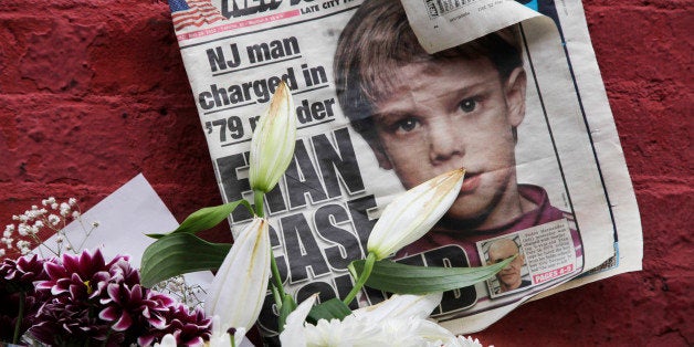 FILE - This May 28, 2012, file photo shows a newspaper with a photograph of Etan Patz that is part of a makeshift memorial in the SoHo neighborhood of New York. While Pedro Hernandez told police he choked 6-year-old Patz in 1979, his defense said it was fiction from a man with an IQ in the bottom 2 percent of the population and mental illness that makes it difficult for him to distinguish real life from fantasy. (AP Photo/Mark Lennihan, File)