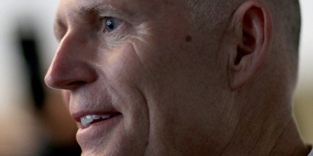 FORT LAUDERDALE, FL - SEPTEMBER 10: Florida Governor Rick Scott attends a meeting with business leaders as he kicks off what he is calling, 'It's Your Money' tax cut tour on September 10, 2013 in Fort Lauderdale, Florida. The Governor is putting together a plan to cut taxes and fees for Florida families by $500 million in the next proposed budget. (Photo by Joe Raedle/Getty Images)