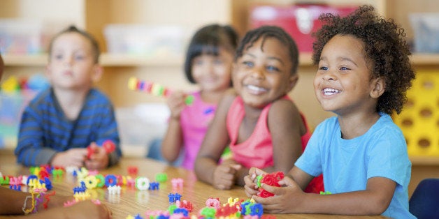 A diverse group of preschoolers in a classroom