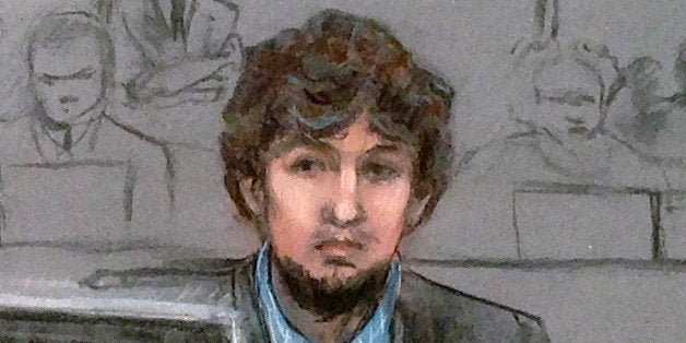 In this courtroom sketch, Dzhokhar Tsarnaev, right, and defense attorney Judy Clarke are depicted watching evidence displayed on a monitor during his federal death penalty trial Monday, March 9, 2015, in Boston. Tsarnaev is charged with conspiring with his brother to place two bombs near the marathon finish line in April 2013, killing three and injuring 260 spectators. (AP Photo/Jane Flavell Collins)