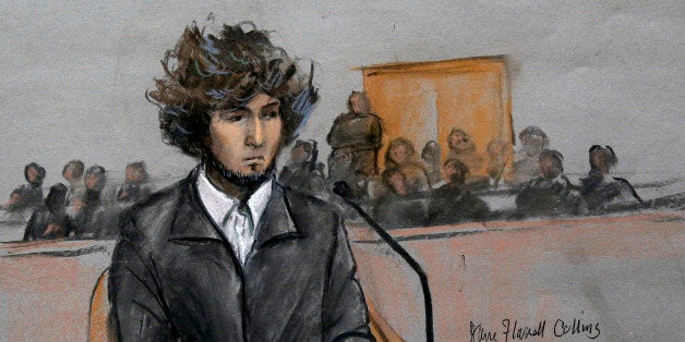 In this courtroom sketch, Boston Marathon bombing suspect Dzhokhar Tsarnaev is depicted sitting in federal court in Boston Thursday, Dec. 18, 2014, for a final hearing before his trial begins in January. Tsarnaev is charged with the April 2013 attack that killed three people and injured more than 260. He could face the death penalty if convicted. (AP Photo/Jane Flavell Collins)