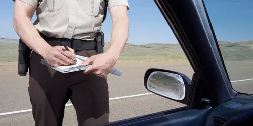 police officers giving a ticket