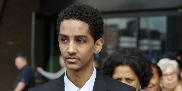 Robel Phillipos leaves federal court Friday, Sept. 13, 2013, in Boston after he was arraigned on charges of hindering the investigation of Boston Marathon bombing suspect Dzhokhar Tsarnaev. Phillipos pleaded not guilty to the charges. (AP Photo/Stephan Savoia)