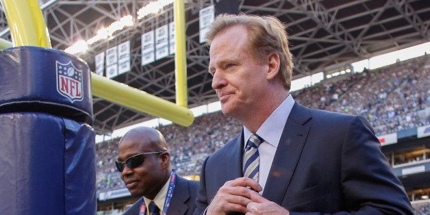 SEATTLE, WA - SEPTEMBER 04: NFL commissioner Roger Goodell (R) walks the sidelines prior to the game between the Seattle Seahawks and the Green Bay Packers at CenturyLink Field on September 4, 2014 in Seattle, Washington. (Photo by Otto Greule Jr/Getty Images)