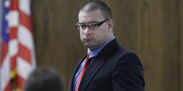 Former Marine Cpl. Eddie Ray Routh enters the court after a break during his capital murder trial at the Erath County, Donald