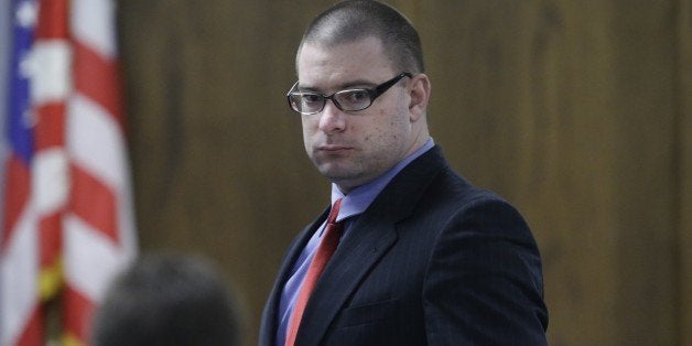 Former Marine Cpl. Eddie Ray Routh enters the court after a break during his capital murder trial at the Erath County, Donald R. Jones Justice Center Thursday, Feb. 19, 2015, in Stephenville, Texas. Routh is charged with the 2013 deaths of former Navy SEAL Chris Kyle and his friend Chad Littlefield at a shooting range near Glen Rose, Texas. (AP Photo/LM Otero,Pool)