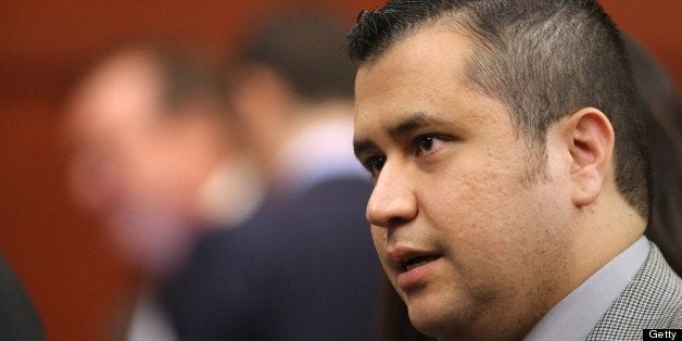 SANFORD, FL - JULY 02: George Zimmerman leaves the courtroom during a recess on the 17th day of his trial in Seminole circuit court, July 2, 2013 in Sanford, Florida. Zimmerman is charged with second-degree murder for the February 2012 shooting death of 17-year-old Trayvon Martin. (Photo by Joe Burbank-Pool/Getty Images)