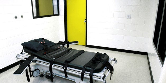 FILE - This Oct. 24, 2001 file photo shows the death chamber at the state prison in Jackson, Ga. The state of Georgia plans to use a compounding pharmacy to get the drug needed for an execution scheduled for next week. A Department of Corrections spokeswoman on Thursday, July 11, 2013 confirmed that the state will get pentobarbital from a compounding pharmacy for the execution of Warren Lee Hill, which is set for Monday, July 15. (AP Photo/Ric Feld, File)