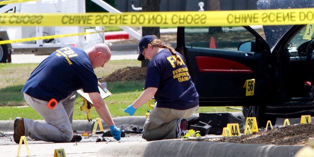 GARLAND, TX - MAY 4: Investigators work a crime scene outside of the Curtis Culwell Center after a shooting occurred the day before May 04, 2015 in Garland, Texas. During the 'Muhammad Art Exhibit and Cartoon Contest,' an anti-Islam event, on May 03, Elton Simpson of Phoenix, Arizonia and another man opend fire, wounding a security guard . Police officers shot and killed Simpson at teh scene. (Photo by Ben Torres/Getty Images)