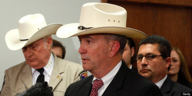 Kirby Dendy, chief of the Texas Rangers, speaks as local, state and federal law enforcement officers hold a press conference