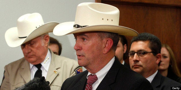 Kirby Dendy, chief of the Texas Rangers, speaks as local, state and federal law enforcement officers hold a press conference in Kaufman, Texas, to talk about the charges against Eric Williams and wife Kim Lene Williams in connection with the murders of the district attorney, his wife and an assistant district attorney, Thursday, April 18, 2013. (Rodger Mallison/Fort Worth Star-Telegram/MCT via Getty Images)