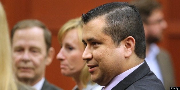 B583057987Z.1 SANFORD, FL - JULY 13: George Zimmerman leaves the courtroom a free man after being found not guilty, on the 25th day of his trial at the Seminole County Criminal Justice Center July 13, 2013 in Sanford, Florida. Zimmerman was charged with second-degree murder in the 2012 shooting death of Trayvon Martin. (Photo by Joe Burbank-Pool/Getty Images)