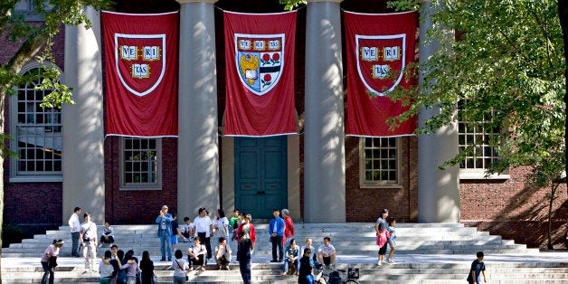 UNITED STATES - SEPTEMBER 03: Harvard banners hang outside Memorial Church on the Harvard University campus in Cambridge, Ma