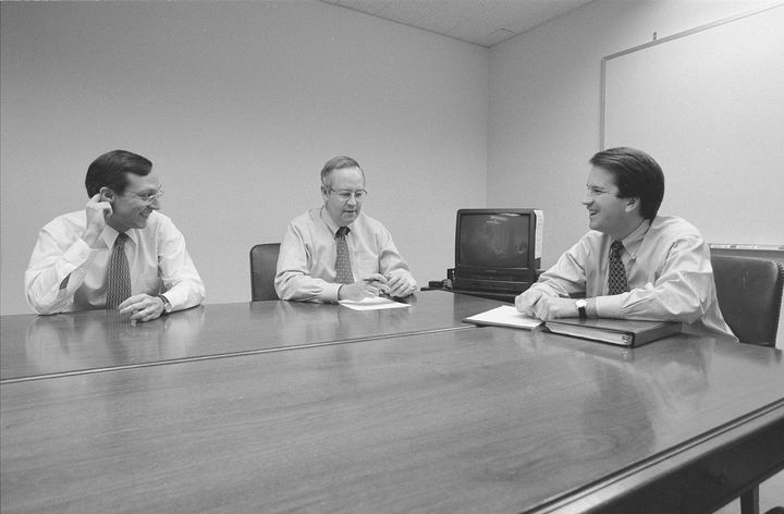 Brett Kavanaugh, right, during a meeting with independent counsel Kenneth Starr, center, and deputy independent counsel John Bates, left, on Nov. 13, 1996.