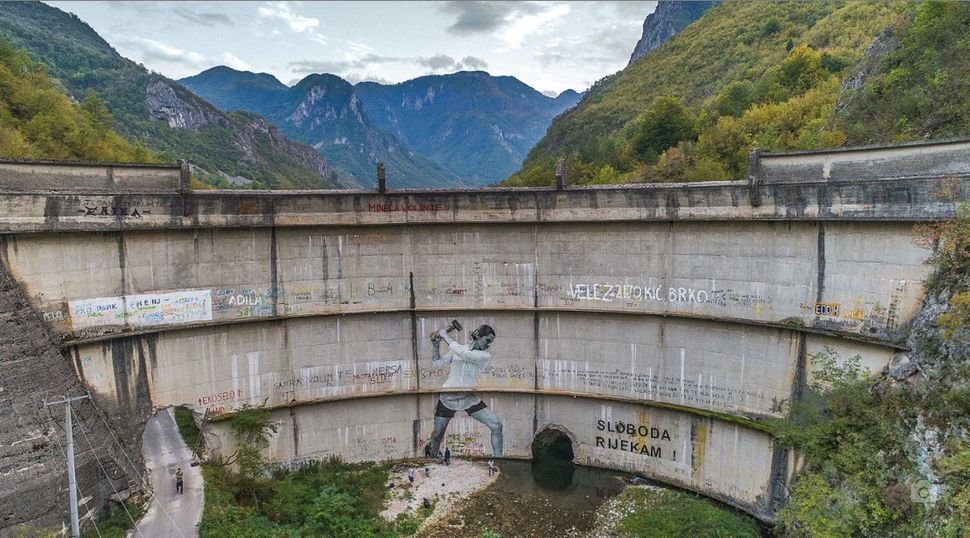 A 15 foot mural on the Idbar dam outside Sarajevo, Bosnia, symbolizing local opposition to dam construction in the Balkans.